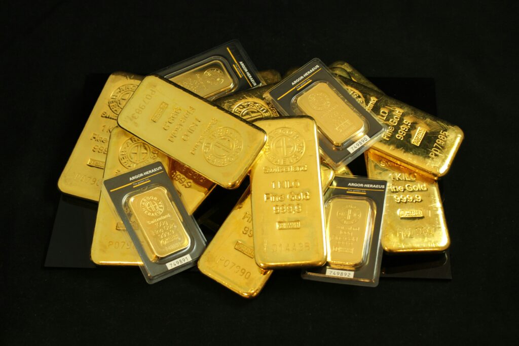 Gold bars symbolizing investment opportunities to safeguard wealth and how to buy gold safely and improve financial wellbeing in uncertain times.